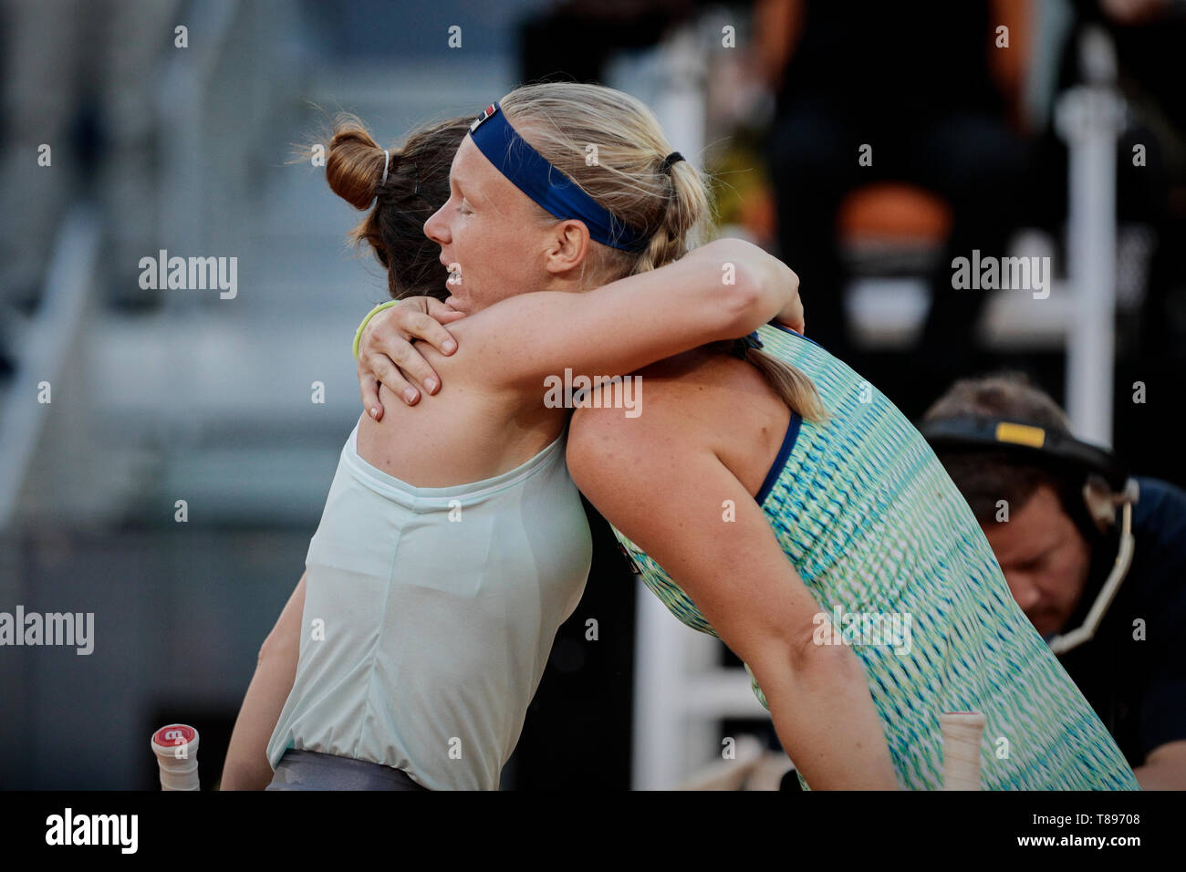 Simona Halep of Romania and Kiki Bertens of Netherlands seen hugging after  the Mutua Madrid Open Masters match on day eight at Caja Magica in Madrid,  Spain. Kiki Bertens beat Simona Halep