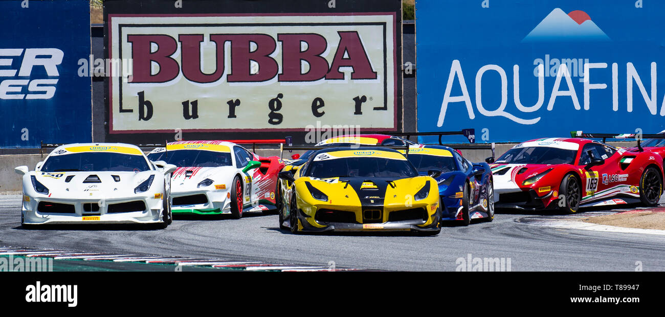 Monterey, California, USA. 11th May 2019. Ferrari Challenge Race 1 S/S-AM racers coming out of turn 11 during the Ferrari Challenge at Weathertech Raceway Laguna Seca Monterey CA Thurman James/CSM Credit: Cal Sport Media/Alamy Live News Stock Photo