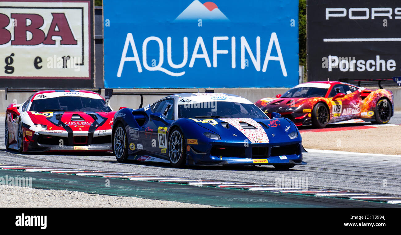 Monterey, California, USA. 11th May 2019. Ferrari Challenge Race 1 S/S-AM # 124 Debra Palermo lead the pack coming out if turn 11 during the Ferrari Challenge at Weathertech Raceway Laguna Seca Monterey CA Thurman James/CSM Credit: Cal Sport Media/Alamy Live News Stock Photo
