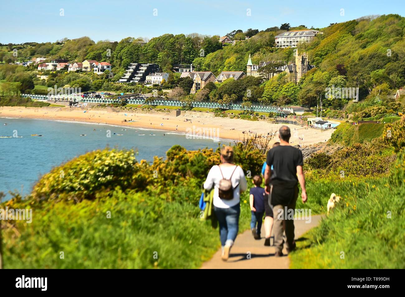 Langland Bay, Gower, Wales, UK. 12th May 2019.  UK weather. People flock to the sandy beach at Langland Bay on the Gower peninsula just outside Swansea on a glorious Sunday afternoon, promising unbroken blue skies and warm spring sunshine . Credit: keith morris/Alamy Live News Stock Photo