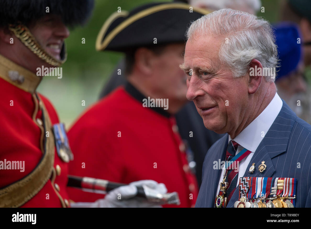 Hyde Park London, UK. 12th May 2019. HRH The Prince of Wales, Field Marshal, Colonel in Chief 1st The Queen’s Dragoon Guards, chats with members of the services and their families after The Combined Cavalry Old Comrades Association 95th annual parade and service. Credit: Malcolm Park/Alamy Live News. Stock Photo