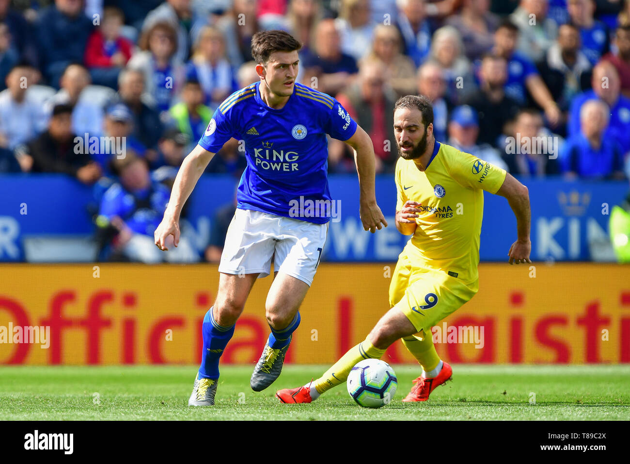 Leicester, UK. 12th May, 2019. Leicester City defender Harry Maguire (15) battles with Gonzalo Higuain (9) of Chelsea during the Premier League match between Leicester City and Chelsea at the King Power Stadium, Leicester on Sunday 12th May 2019. (Credit: Jon Hobley | MI News) Editorial use only, license required for commercial use. Photograph may only be used for newspaper and/or magazine editorial purposes. Credit: MI News & Sport /Alamy Live News Stock Photo