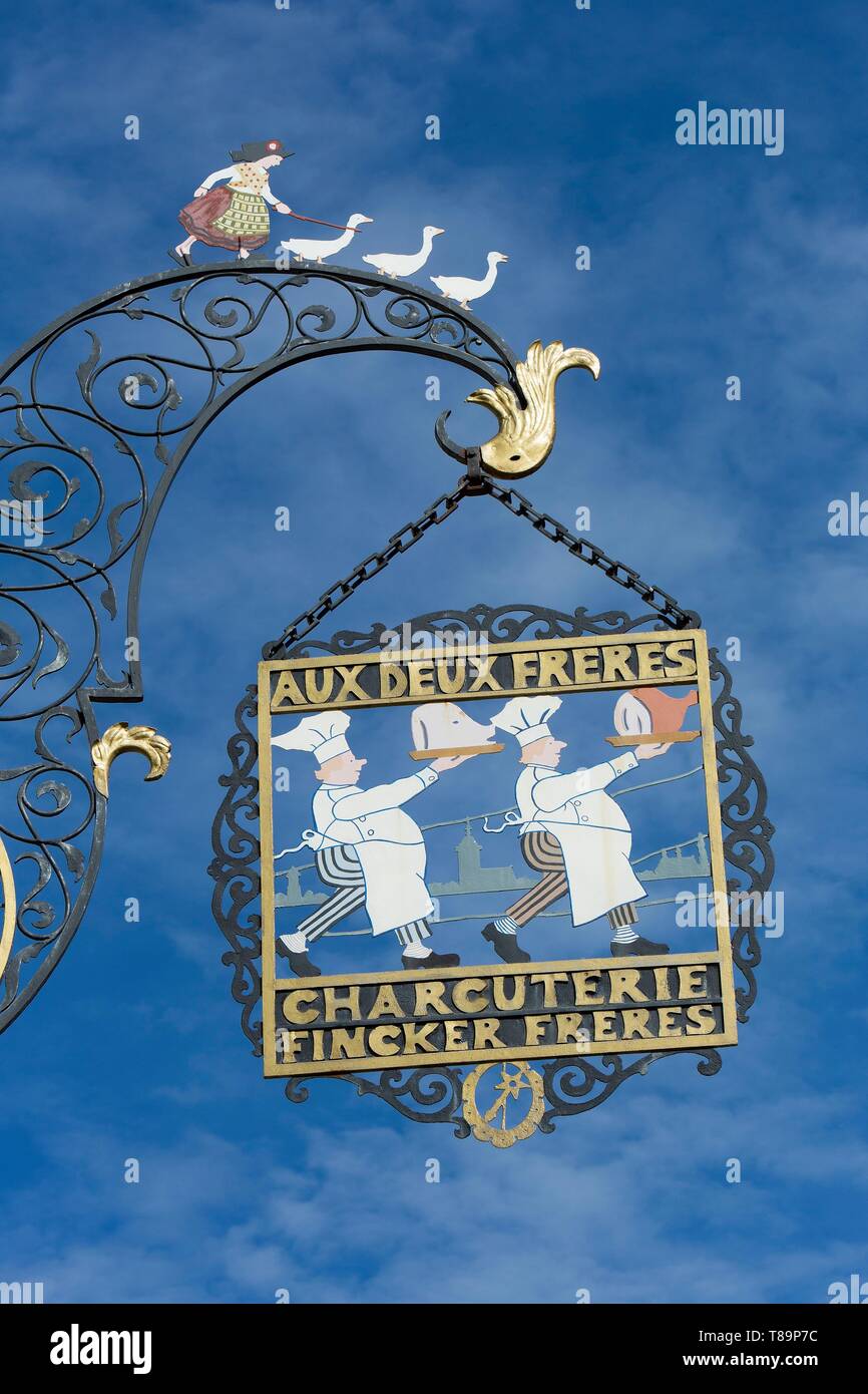 France, Haut Rhin, Route des Vins d'Alsace, Colmar, detail of the shop sign of Pork butcher's shop and delicatessen Aux Deux Freres Stock Photo