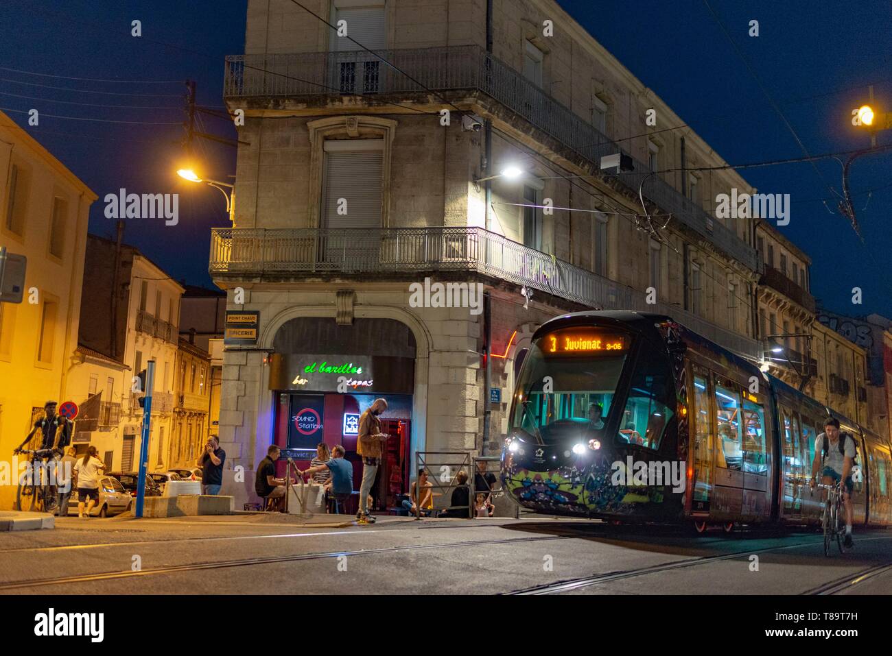 France, Herault, Montpellier, Pont deLattes Street, passage of a streetcar at night Stock Photo