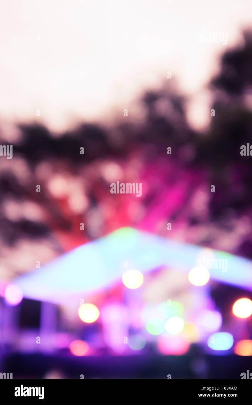 Defocused marquee with lights in the evening. Stock Photo