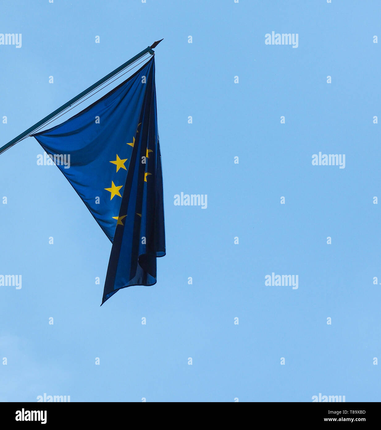 flag of the European Union (EU) aka Europe over blue sky Stock Photo ...