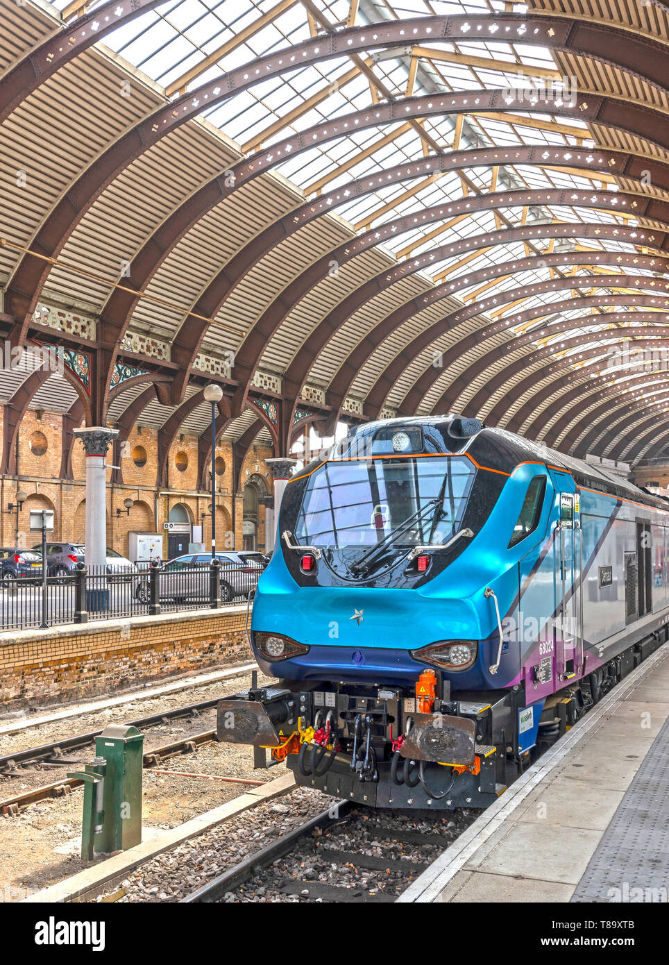 Train engine with unusual lines beside a platform at York Station. The ...