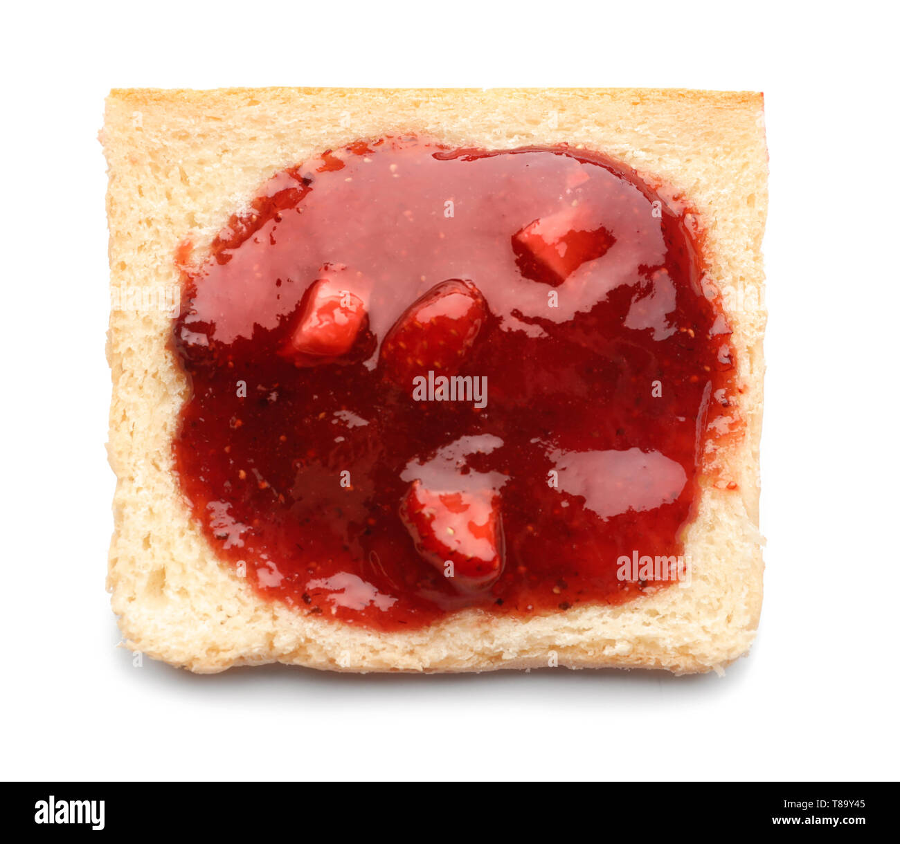 Toast with tasty strawberry jam on white background Stock Photo - Alamy