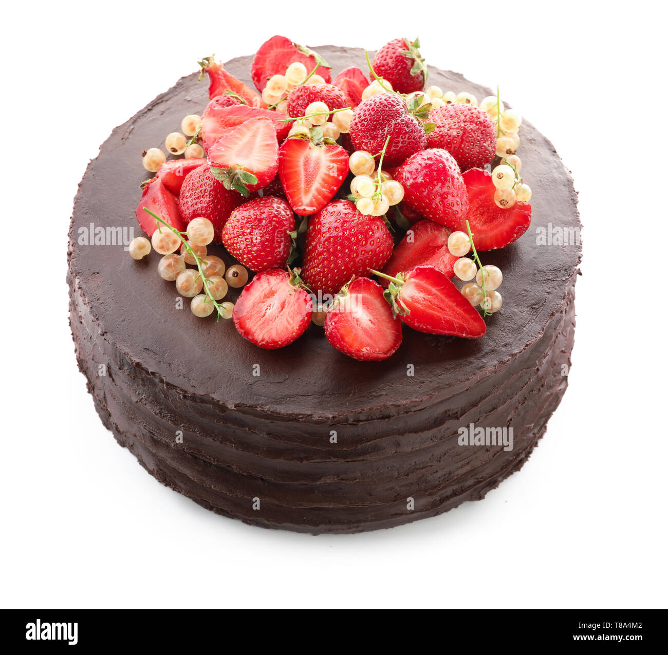 Tasty chocolate cake with strawberries and currants on white background ...