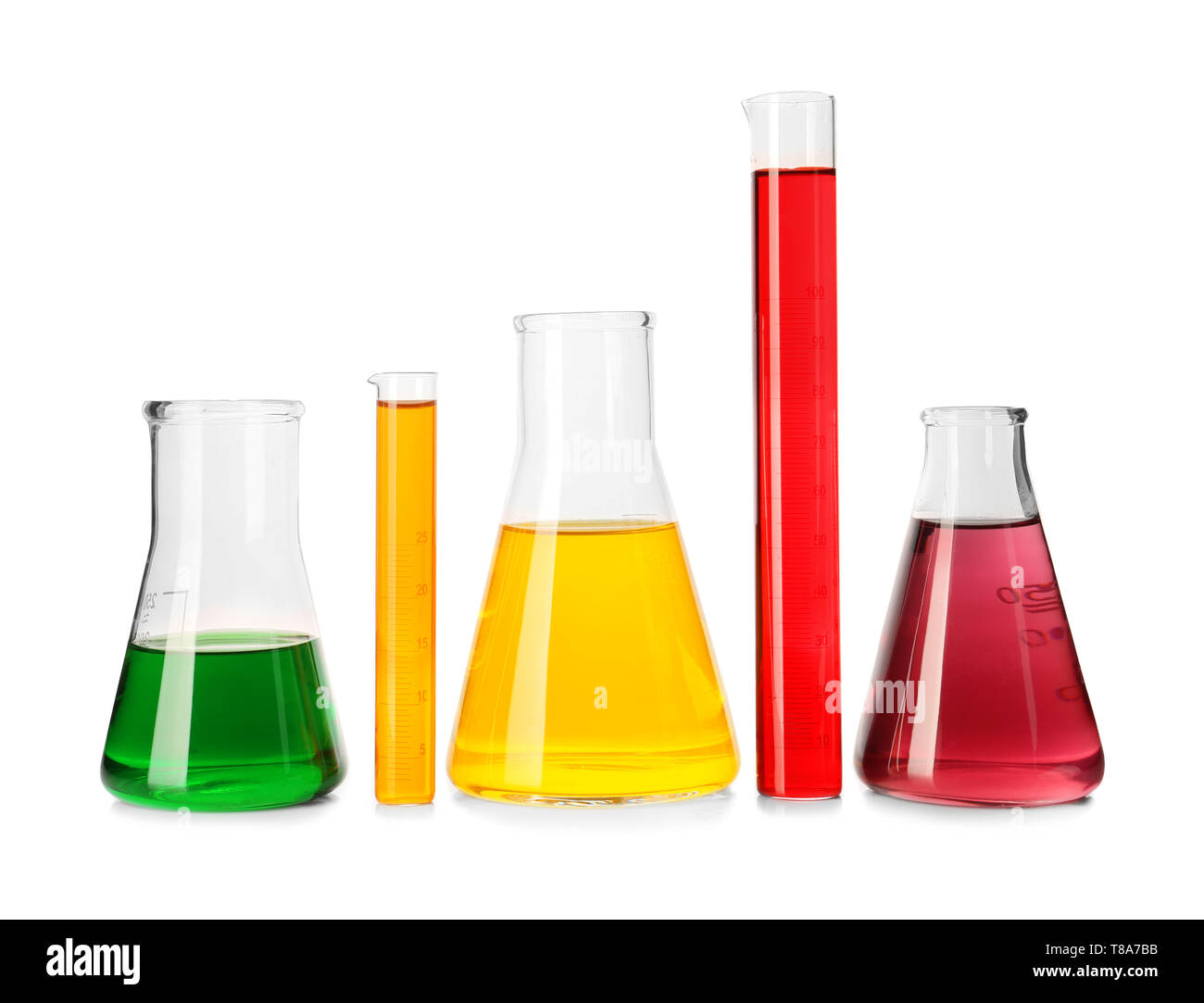 Laboratory glassware with colorful liquids on white background Stock ...