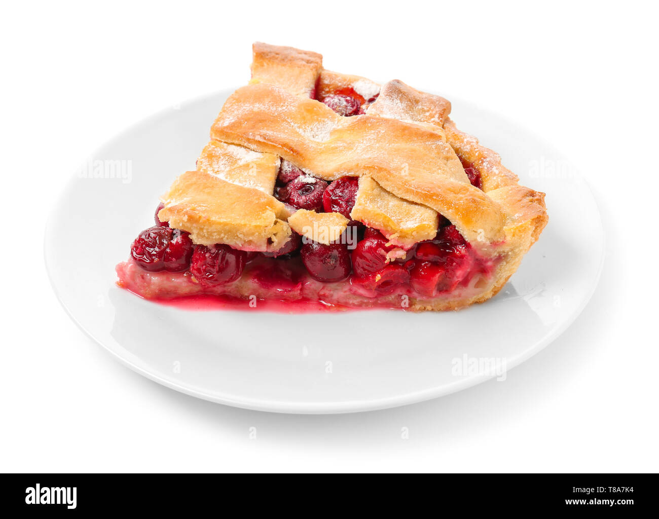 Plate with piece of delicious cherry pie on white background Stock ...