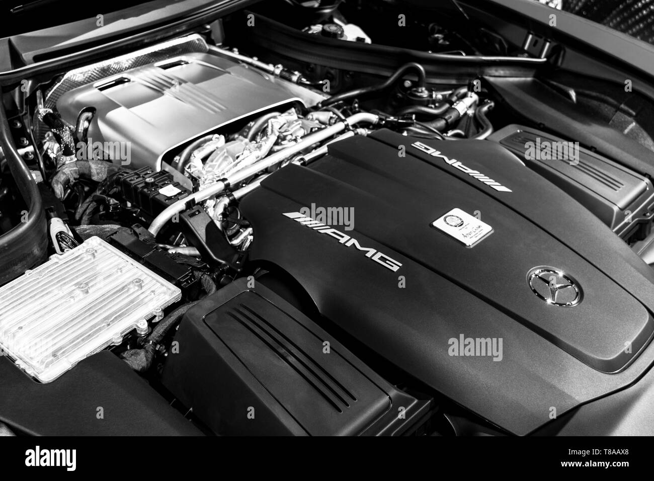 Sankt-Petersburg, Russia, January 12, 2018 : Close up of Mercedes-Benz engine AMG GTR 2018 V8 Bi-turbo exterior details. Powerful handcrafted engine.  Stock Photo