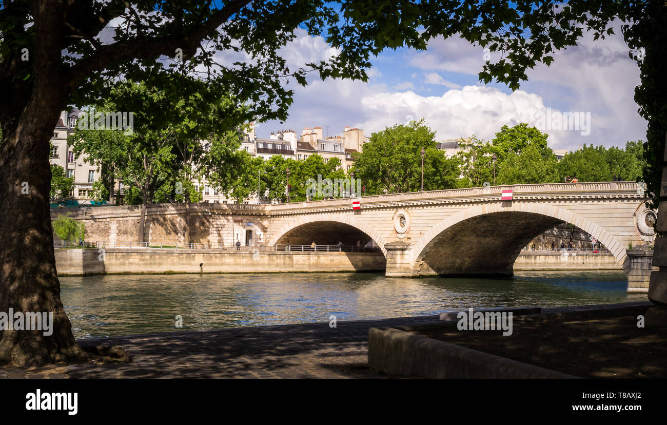 Parisian bridge and the Seine river seen from Saint Louis island in
