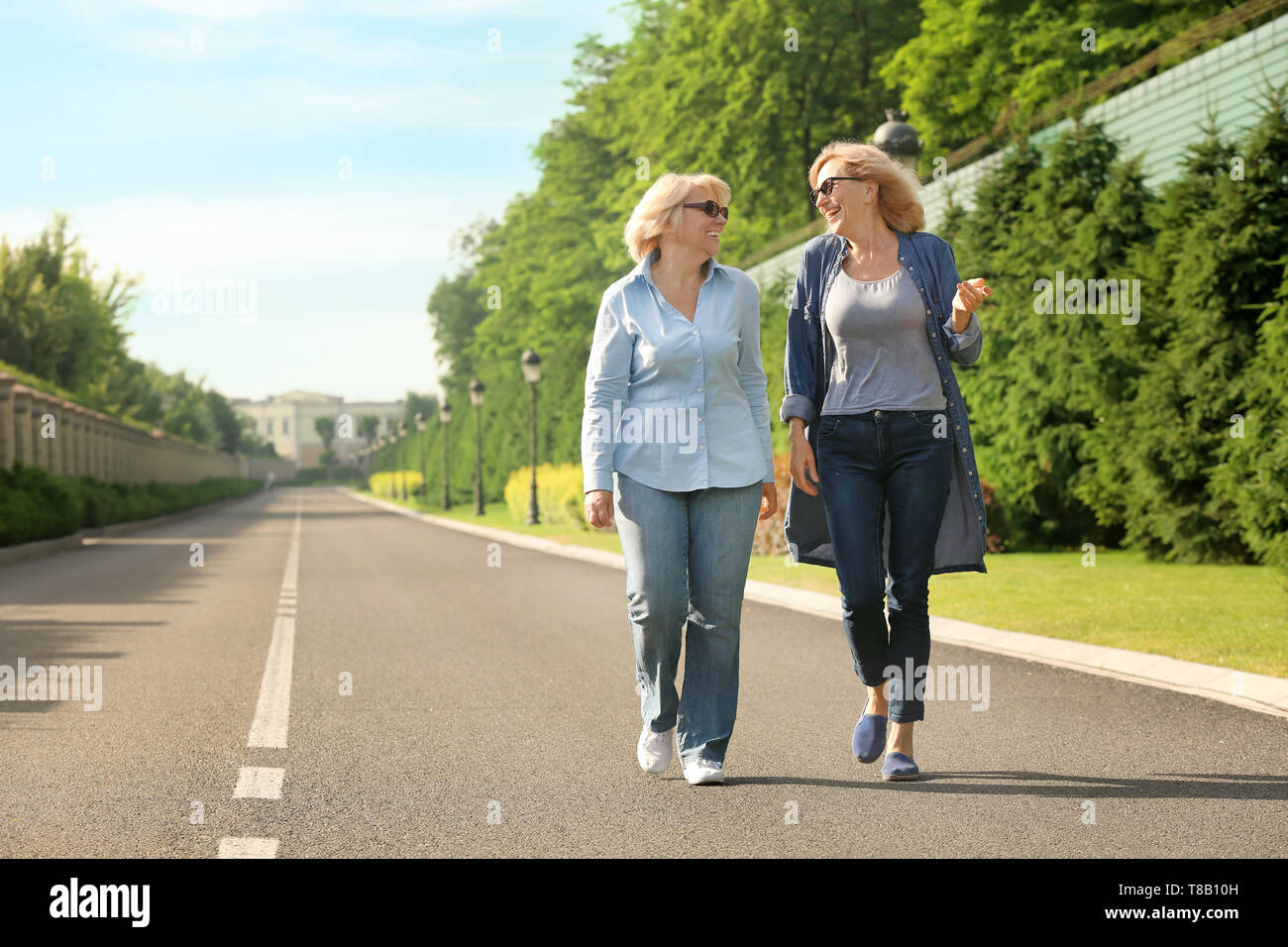Mature women walking hi-res stock photography and images - Alamy