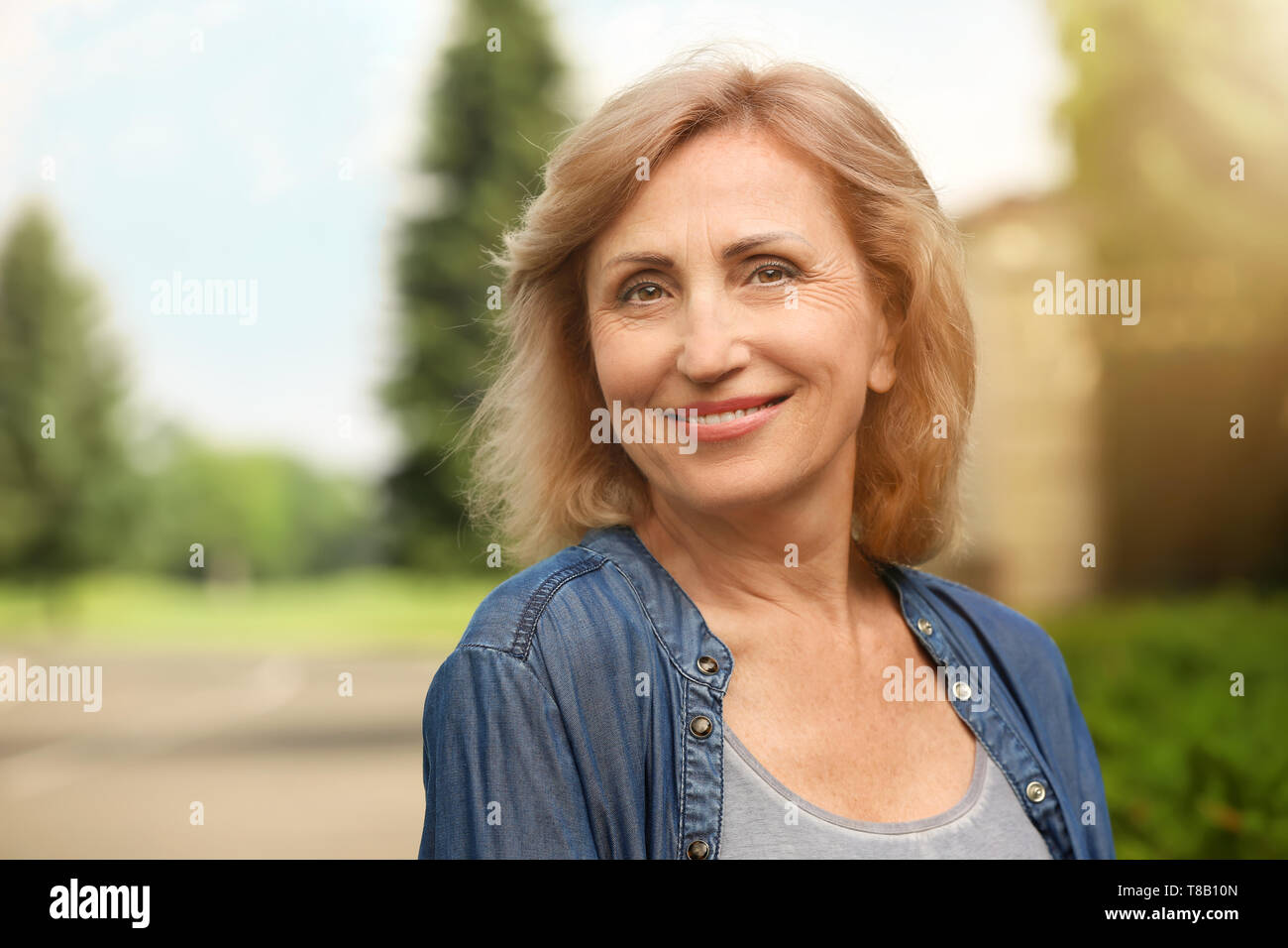Portrait of beautiful mature woman outdoors Stock Photo Alamy