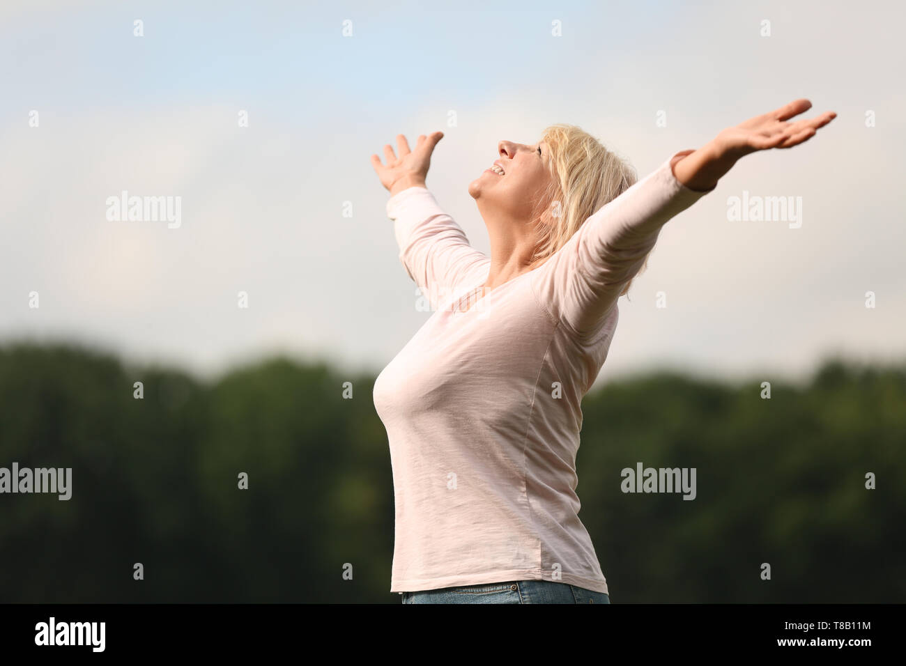 Beautiful mature woman outdoors hi-res stock photography and images - Alamy