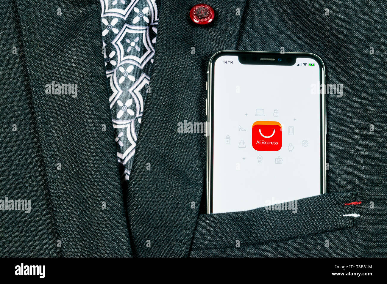 Sankt-Petersburg, Russia, August 24, 2018: Aliexpress application icon on Apple iPhone X smartphone screen cin jacket pocket. Aliexpress app icon. Ali Stock Photo