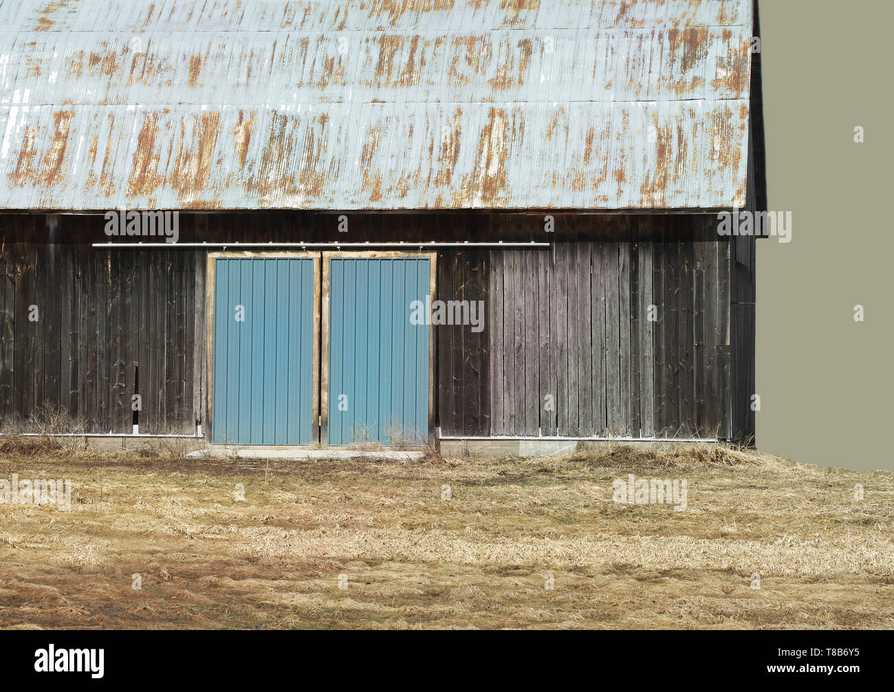 Old worn barn with added abstract color Stock Photo