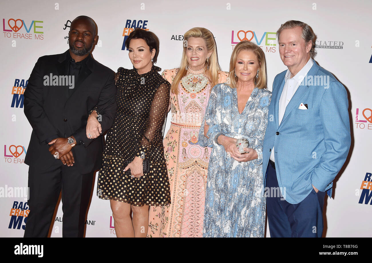 BEVERLY HILLS, CA - MAY 10: (L-R) Corey Gamble, Kris Jenner, Nancy Davis, Kathy Hilton and Rick Hilton attend the 26th Annual Race to Erase MS Gala at The Beverly Hilton Hotel on May 10, 2019 in Beverly Hills, California. Stock Photo