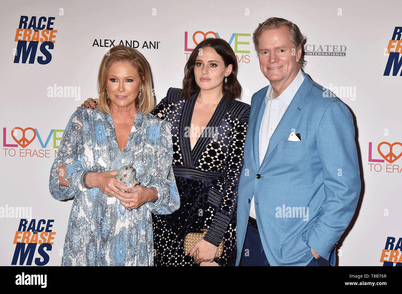 BEVERLY HILLS, CA - MAY 10: (L-R) Kathy Hilton, Alexa Dell and Rick Hilton attend the 26th Annual Race to Erase MS Gala at The Beverly Hilton Hotel on May 10, 2019 in Beverly Hills, California. Stock Photo