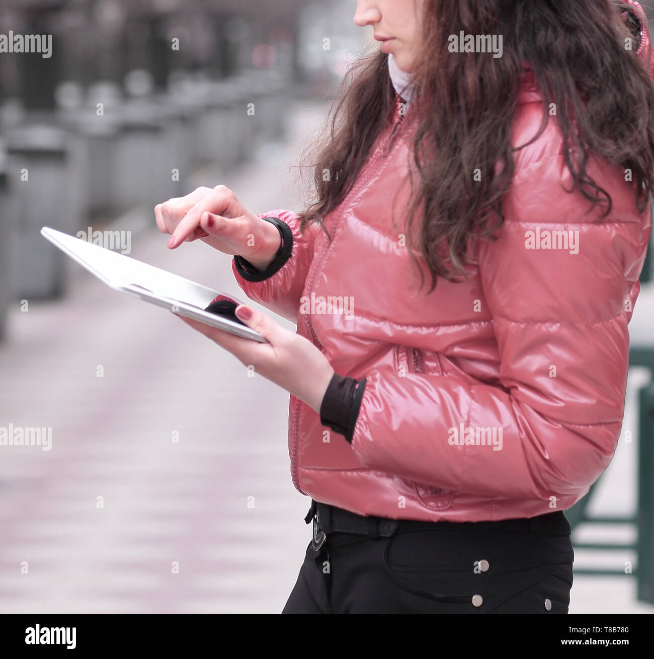 smiling woman looking at digital tablet screen Stock Photo - Alamy