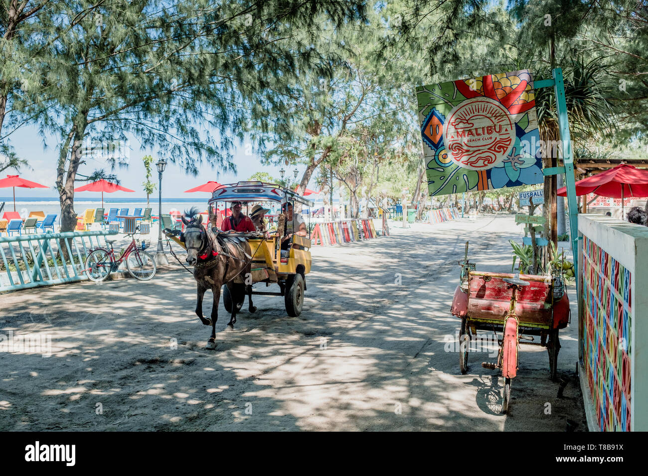 Cidomo horse carts are a traditional and common form of transportation in Lombok and Gili Trawangan Stock Photo