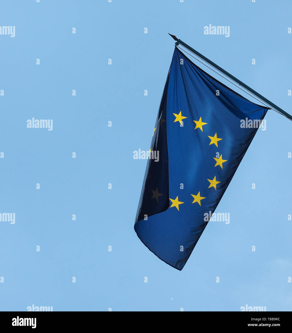 flag of the European Union (EU) aka Europe over blue sky Stock Photo