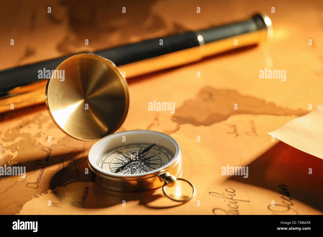 Vintage compass on world map Stock Photo - Alamy