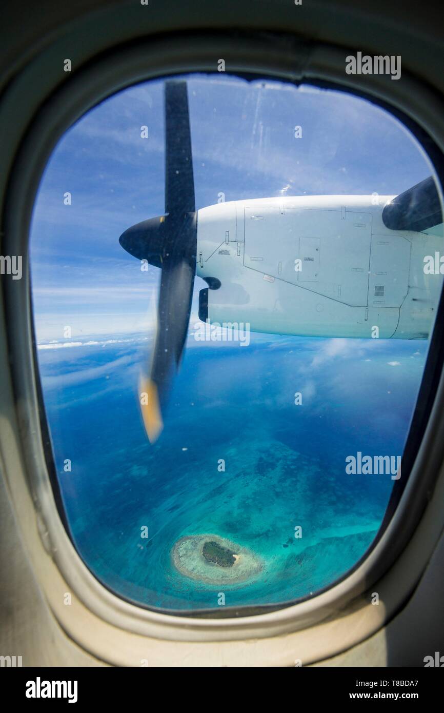 Papua New Guinea, Milne Bay Province, Encastreaux Sea, Trobriands Archipelago, Kiriwina Island, from the plane window (arial view) Stock Photo