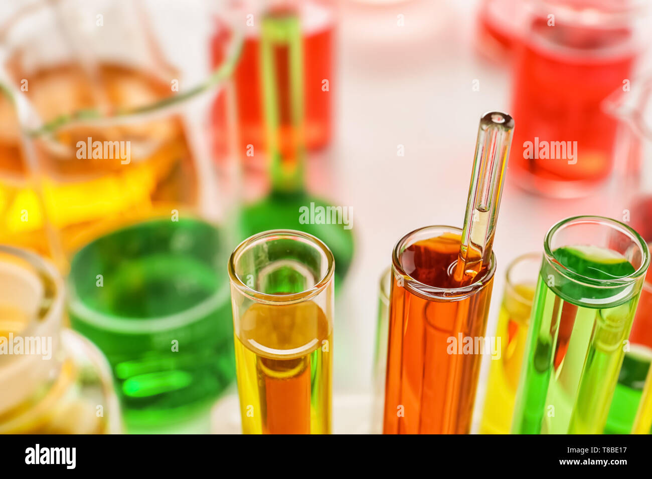 Test tubes with colorful samples in laboratory, closeup Stock Photo - Alamy