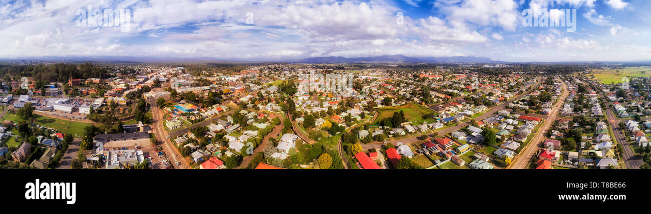 Town centre of Cessnock remote regional settlement in Hunter Valley of Australia. Wide aerial panorama over popular wine making region above streets,  Stock Photo