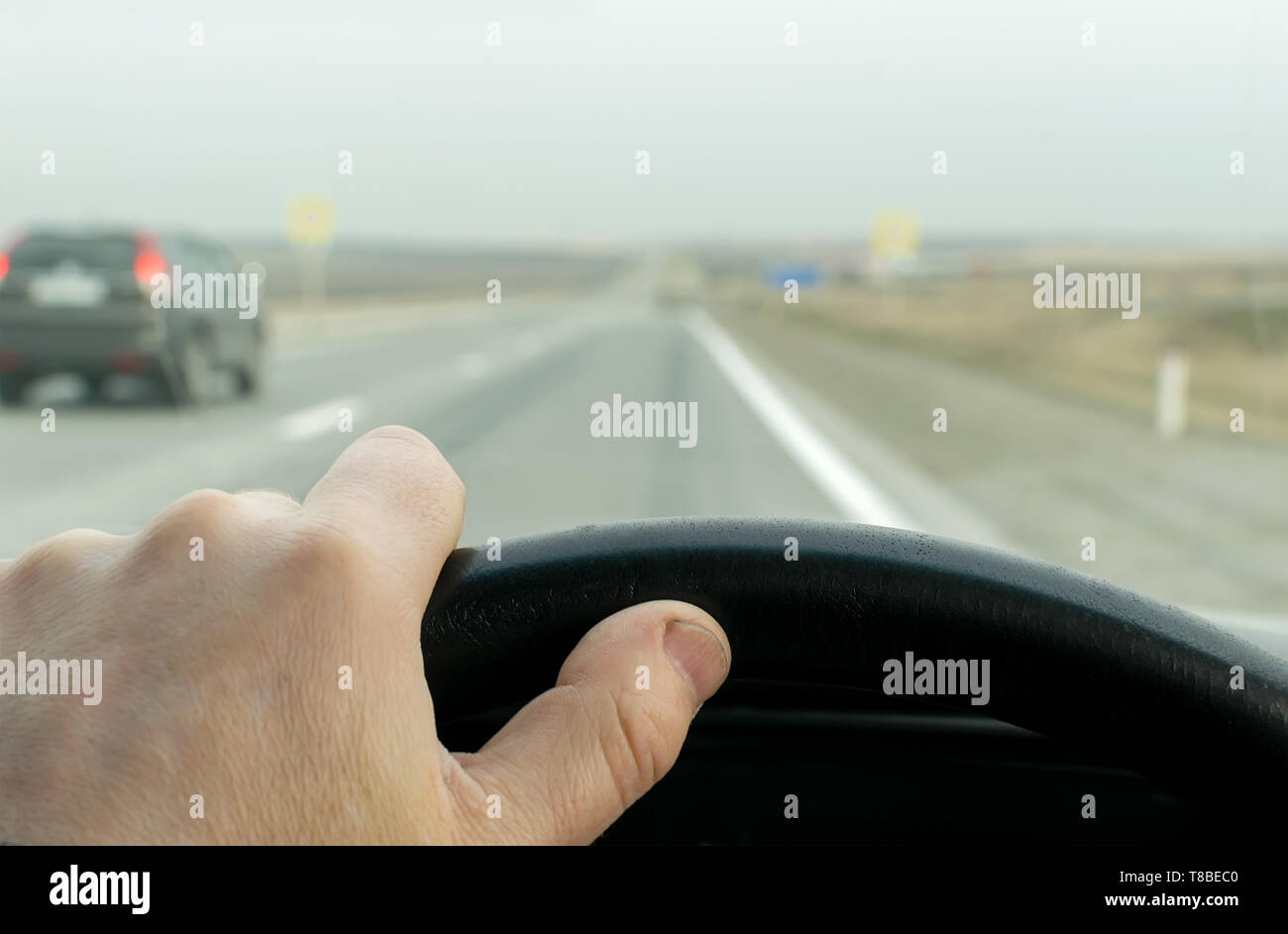 Drivers hand holding steering wheel hi-res stock photography and images ...