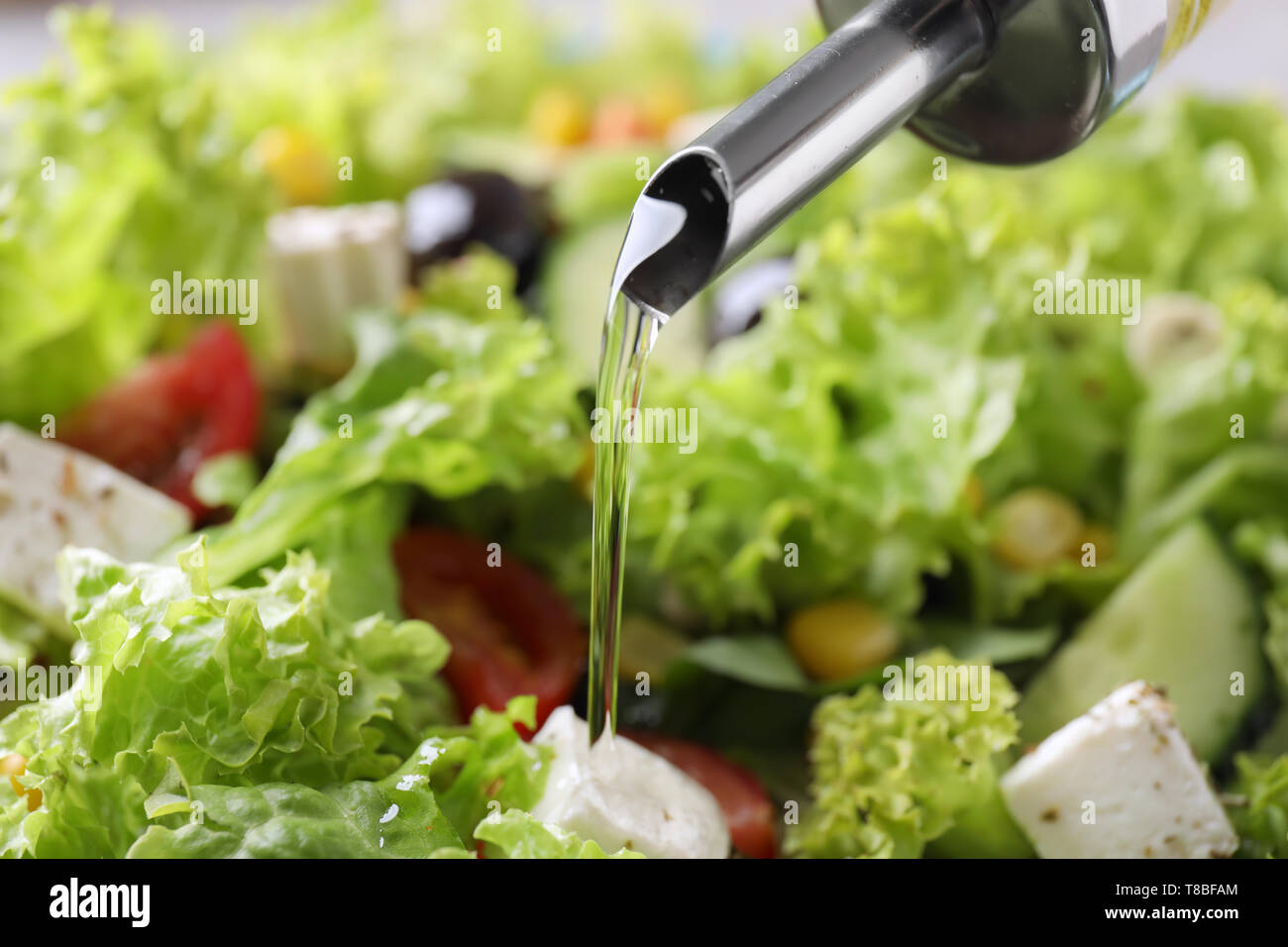 Adding Fresh Oil Adding salad ingredients hi-res stock photography and images - Alamy