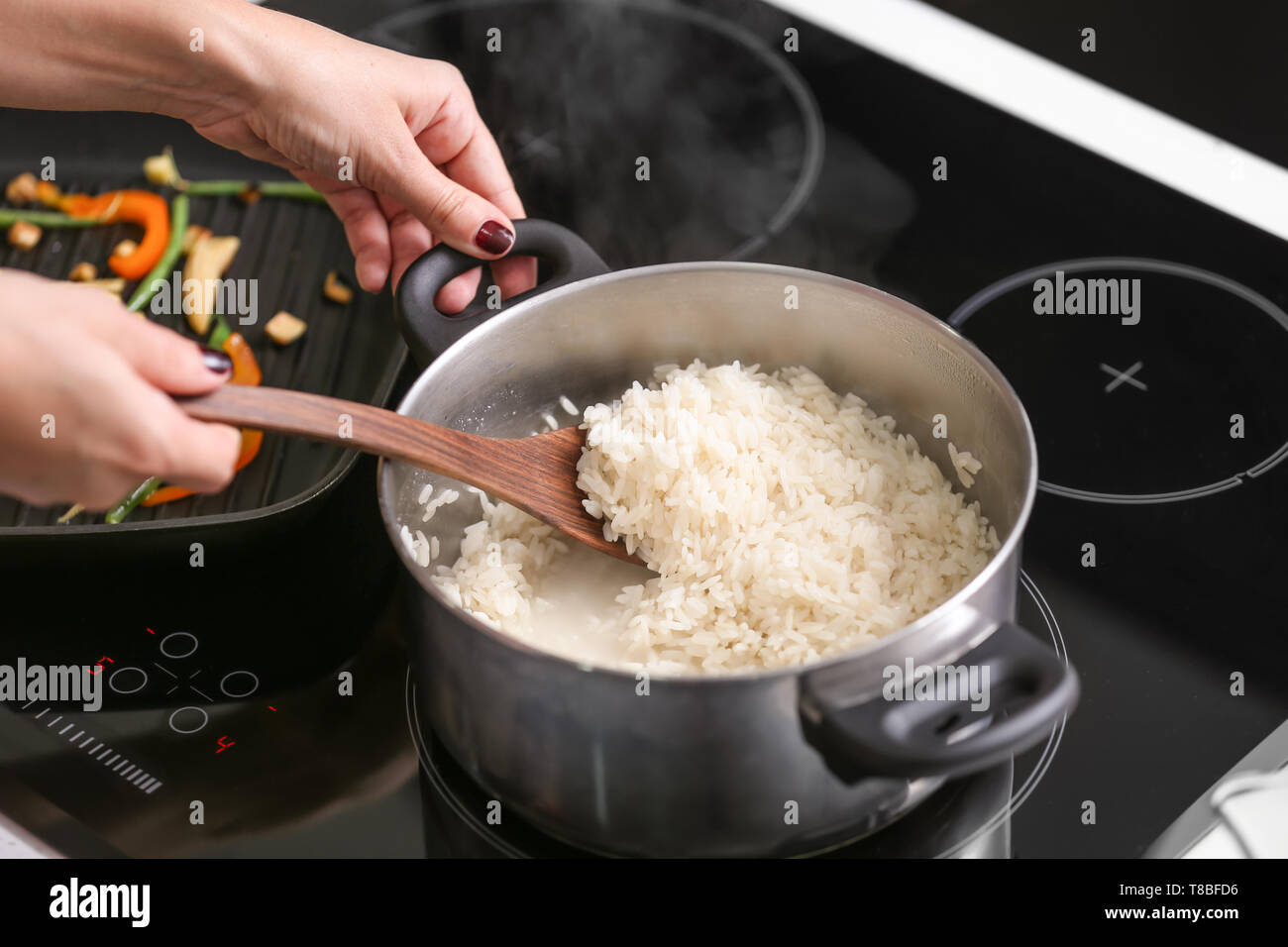 Boiling rice hires stock photography and images Alamy