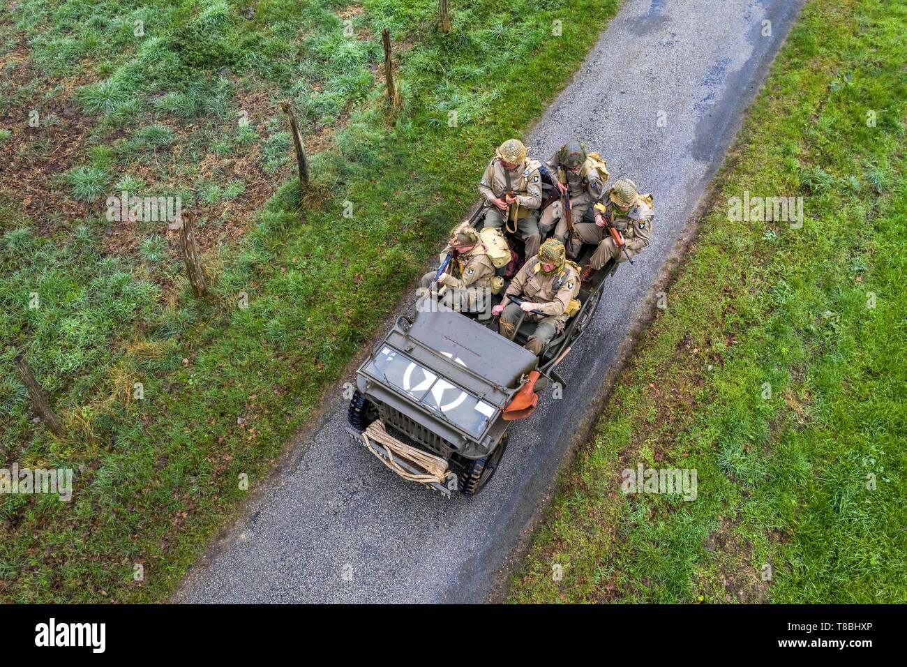France, Eure, Sainte Colombe prÚs Vernon, Allied Reconstitution Group (US World War 2 and french Maquis historical reconstruction Association), reenactors in uniform of the 101st US Airborne Division progressing in a jeep Willys (aerial view) Stock Photo