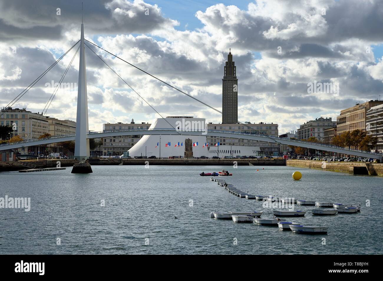 France, Seine Maritime, Le Havre, Downtown rebuilt by Auguste Perret listed as World Heritage by UNESCO, Perret buildings around the Bassin du Commerce, the footbridge, the Volcan created by Oscar Niemeyer and the Lantern tower of Saint Joseph church Stock Photo