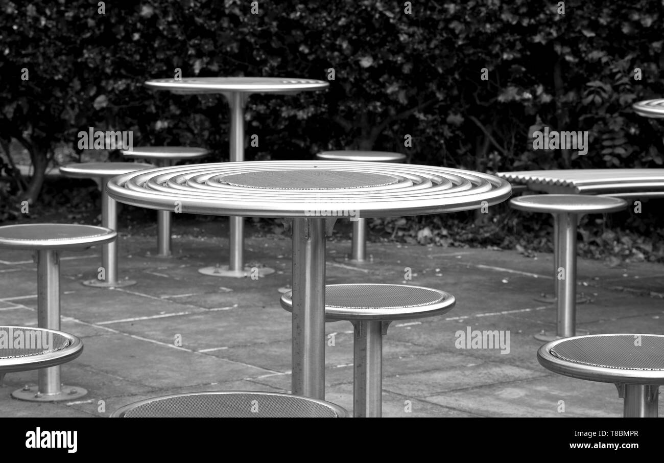 Polished stainless steel outdoor furniture Stock Photo Alamy