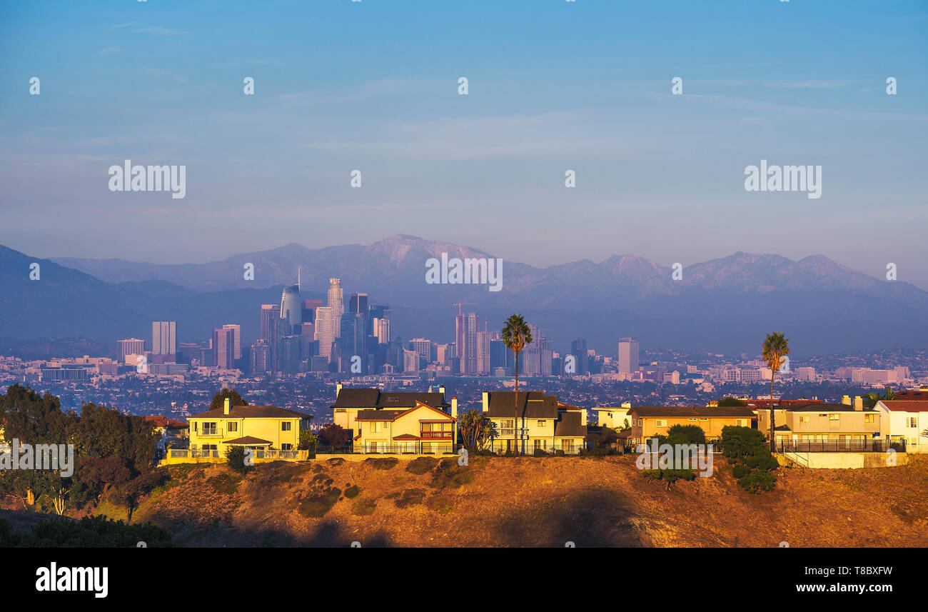 Luxury villas of Los Angeles in California with city skyline in the background Stock Photo