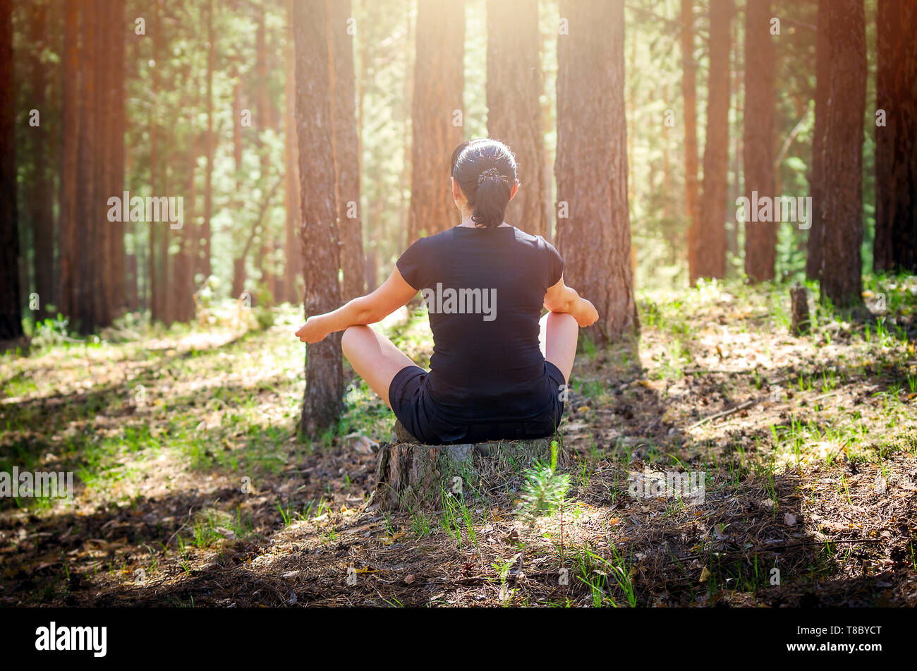Relaxed Woman Sitting in a Comfortable, Upright Position and Practicing ...