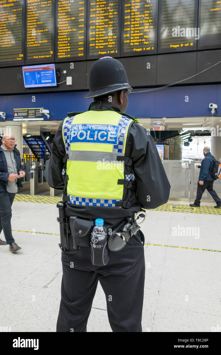 A black British Transport policeman on duty at Waterloo Station, London, England, UK Stock Photo