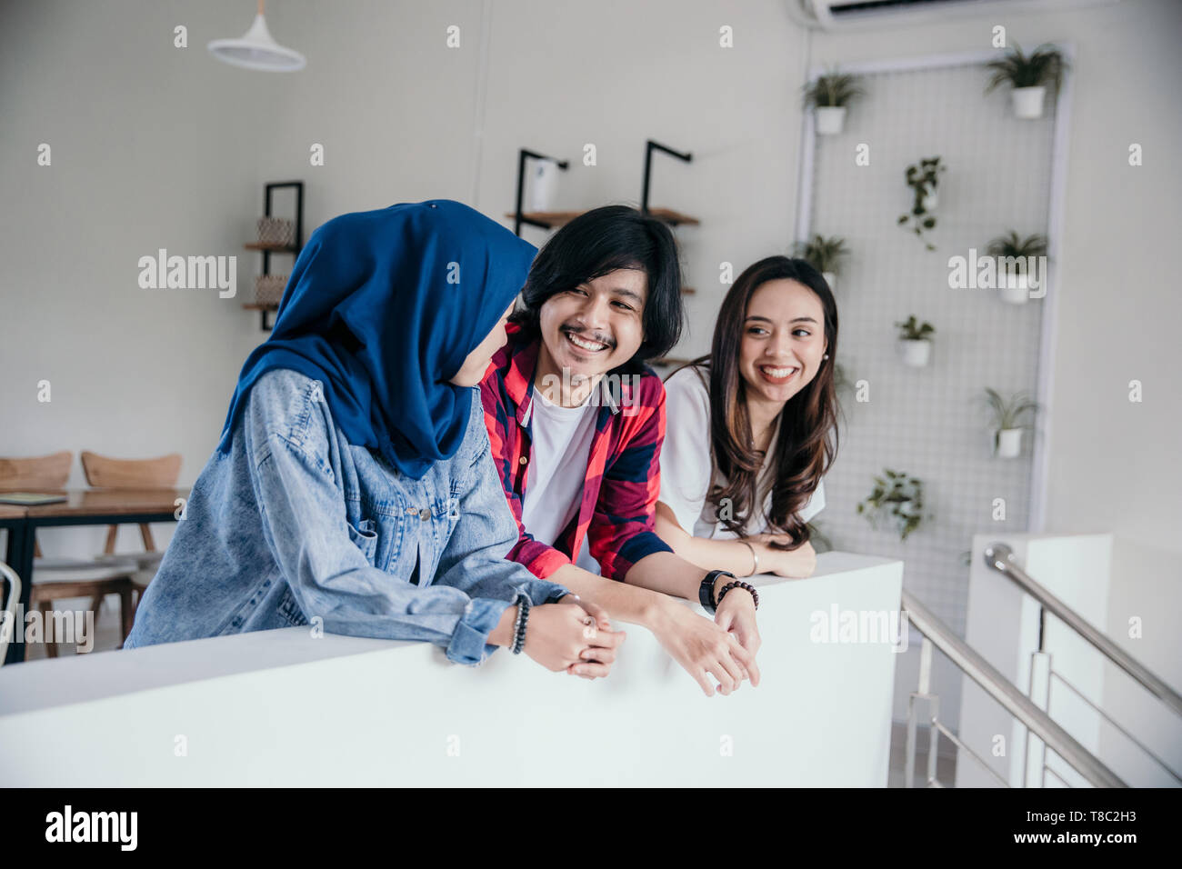 Asian team friend brainstorming hi-res stock photography and images - Alamy