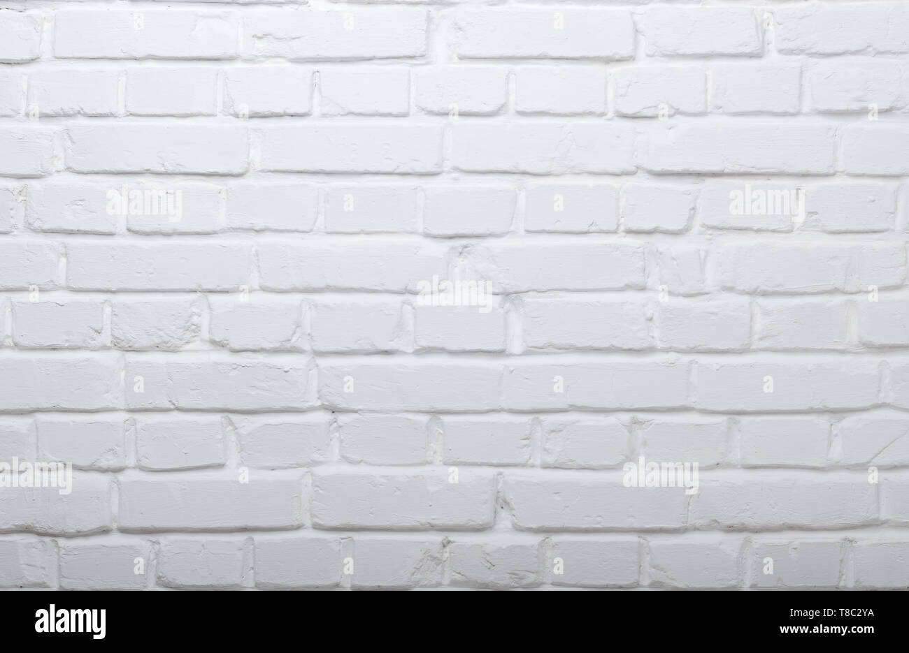 White painted authentic brick wall background Stock Photo - Alamy