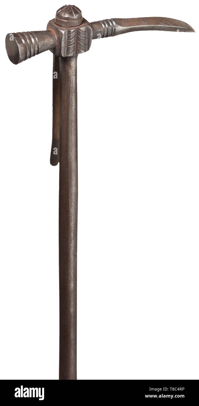 A horseman's hammer, early 17th century Slender, bent quadrangular spike, with round hammer head on the reverse and lateral belt hook. Shaft of circular section, facetted above the guard disc. Grip with cord wrapping of earlier date, lead pommel with rosette rivet. Head and shaft with plain line pattern. Length 55 cm. historic, historical, tool, tools, military, militaria, fighting device, object, objects, stills, clipping, cut out, cut-out, cut-outs, metal, metals, weapon, arms, weapons, arms, utensil, piece of equipment, utensils, Zubeh 17th ce, Additional-Rights-Clearance-Info-Not-Available Stock Photo