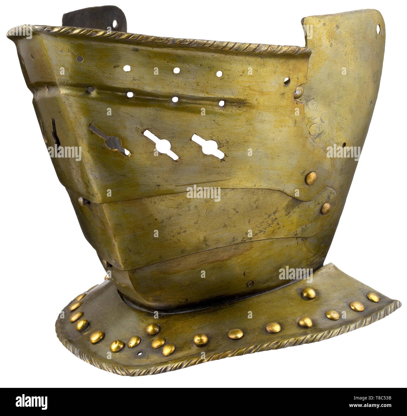 A German pivoted visor, circa 1580 Visor for a light-weight close helmet, assembled from old parts. The face guard sliding on two lames with spring-loaded bolt lock. The upper plate with finely turned-under and roped edge as well as dot-shaped and slotted ventilation holes. The bevor with holes for the hinges on the sides, the right side with suspension loop for a hook-and-eye closure (one old repair on the left lower edge). Collar plate with roped edge and decorations made from brass-plated rivets. Old, yellowed varnish. Height 23 cm. historic, , Additional-Rights-Clearance-Info-Not-Available Stock Photo