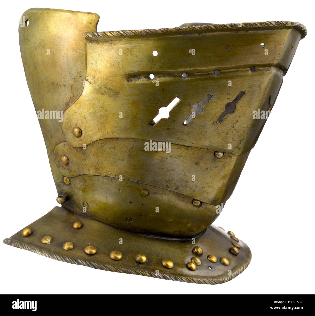 A German pivoted visor, circa 1580 Visor for a light-weight close helmet, assembled from old parts. The face guard sliding on two lames with spring-loaded bolt lock. The upper plate with finely turned-under and roped edge as well as dot-shaped and slotted ventilation holes. The bevor with holes for the hinges on the sides, the right side with suspension loop for a hook-and-eye closure (one old repair on the left lower edge). Collar plate with roped edge and decorations made from brass-plated rivets. Old, yellowed varnish. Height 23 cm. historic, , Additional-Rights-Clearance-Info-Not-Available Stock Photo