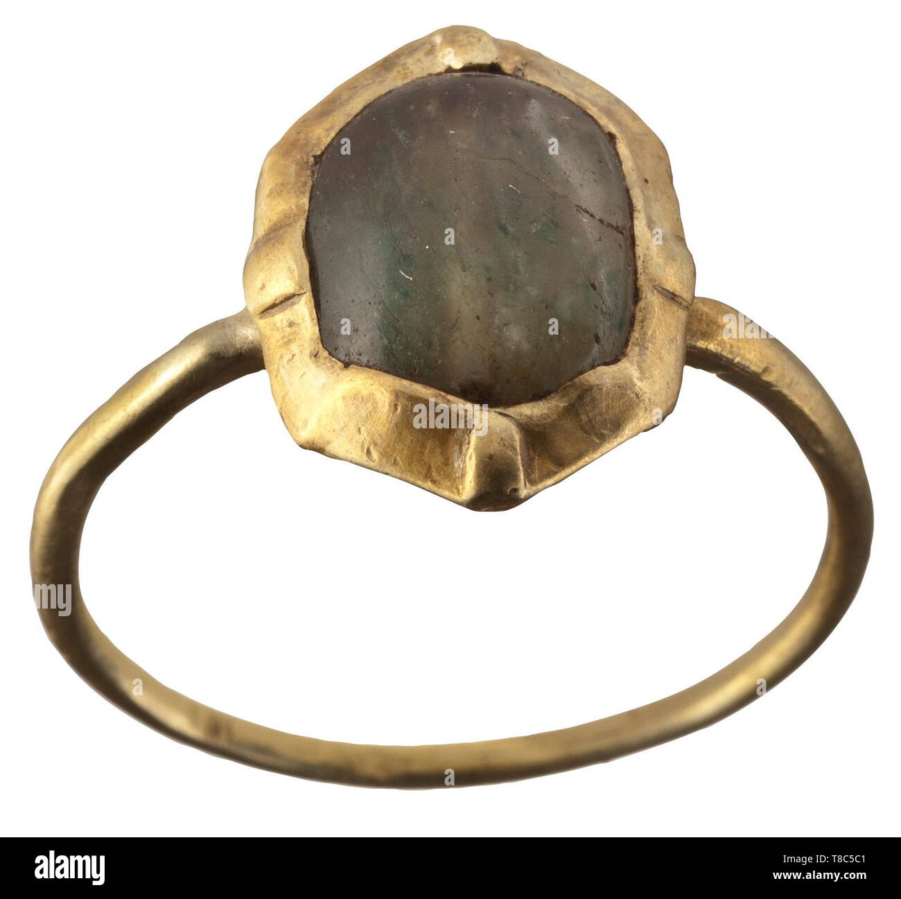 A gold ring, 13th century Thin round band, green gem in a box bezel setting. Width 2.1 cm, weight 2.53 g. historic, historical, handicrafts, handcraft, craft, object, objects, stills, clipping, clippings, cut out, cut-out, cut-outs, middle ages, Additional-Rights-Clearance-Info-Not-Available Stock Photo