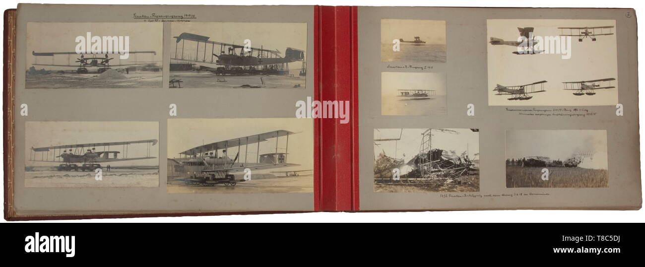 A photo album of the navy air force base Warnemünde The captioned album with circa 180 excellent photos (predominantly in the size 10 x 15 to 14 x 21 cm) of the German navy air force, five other photos loosely enclosed. Biplanes of many types, aerial shots of military facilities and villages from the North Sea to the Baltic Sea (the islands Föhr and Sylt, Helgoland, Norderney, Ösel and Runö, Courland, Estonia and Finland). Group photo with medals, aircraft with special livery, markings, technical details (compass), cockpits, aerial shots of the German fleet. Pictures of air, Editorial-Use-Only Stock Photo