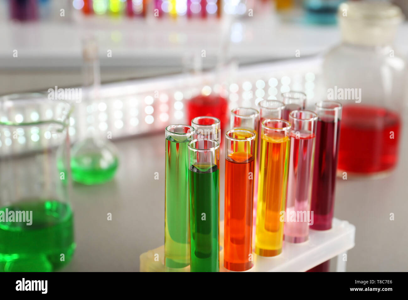Test tubes with colorful samples in laboratory Stock Photo - Alamy