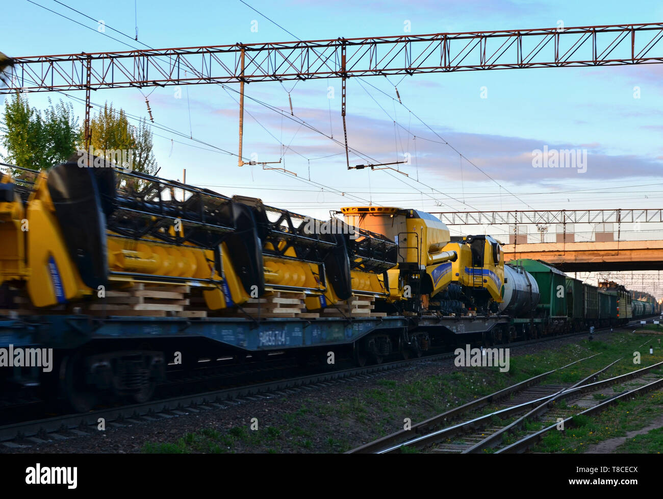 Transporting combine harvesters by rail. Cargo transportation by ...