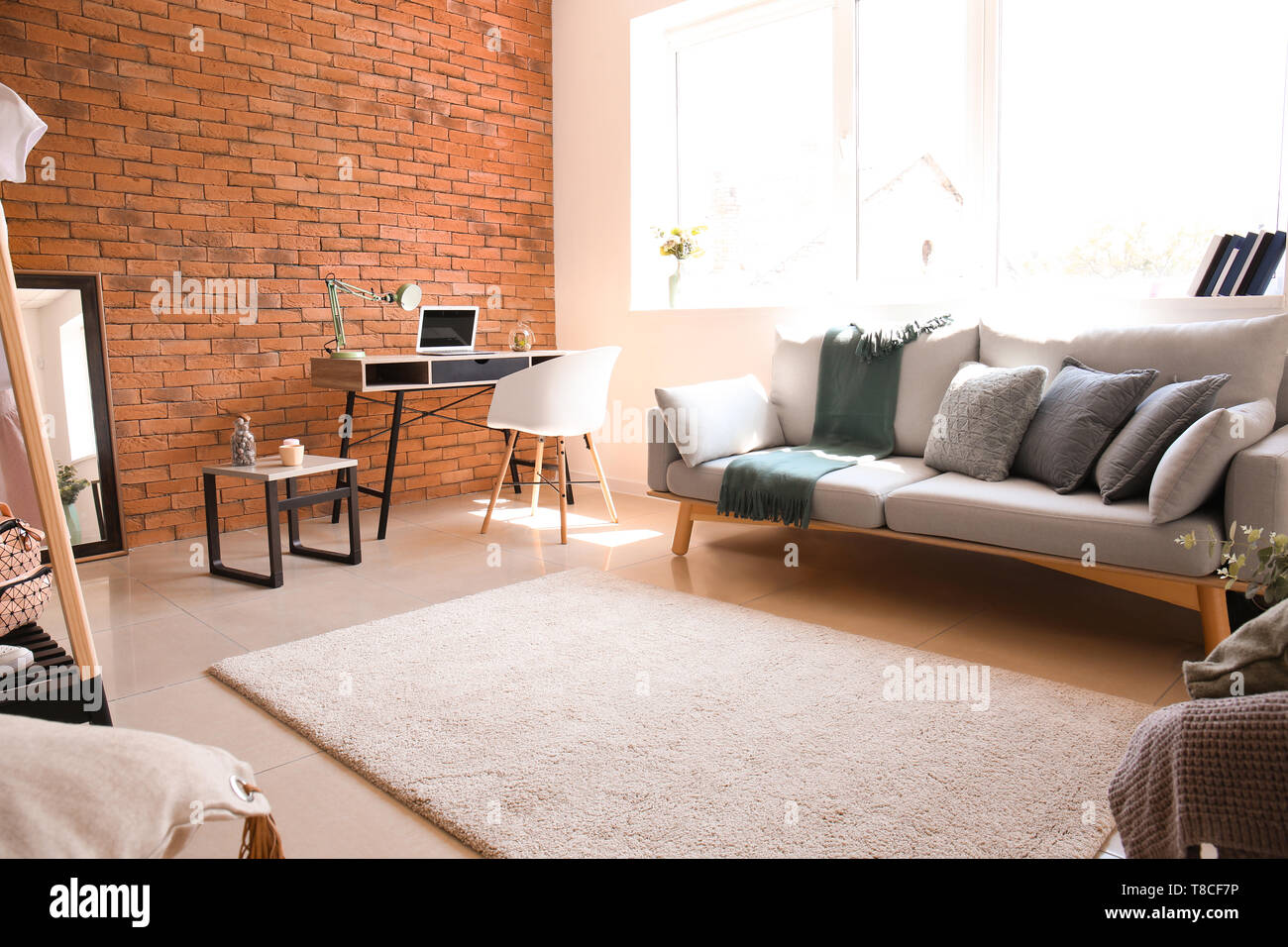 Modern interior of living room with stylish furniture Stock Photo - Alamy